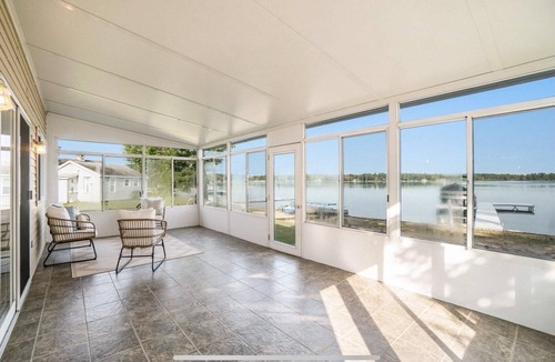 Gaylord House | Marvelous 4-bedroom lake house in Gaylord with sunset views & private beach