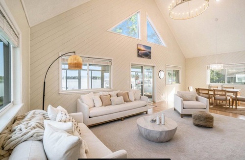 Gaylord House | Marvelous 4-bedroom lake house in Gaylord with sunset views & private beach