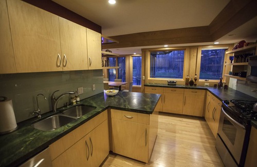 Midland House | Mid-Century Modern Retreat on Private 10 Acres with 1-Acre Pond & Nature Trails.