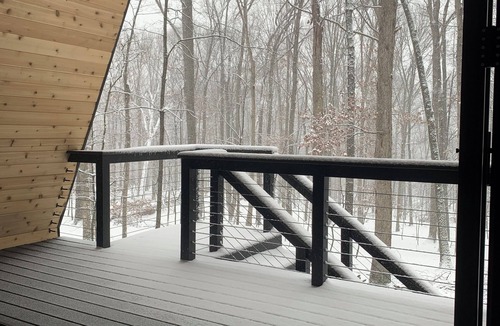 Great Cacapon Cabin | Modern Black A-frame retreat in the woods of Great Cacapon,WV - river access