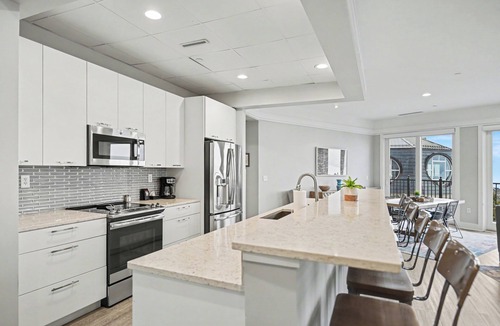 Bay Harbor Condo | Modern Bliss 466: Luxurious 3BR condo in Bay Harbor with stunning lake views.