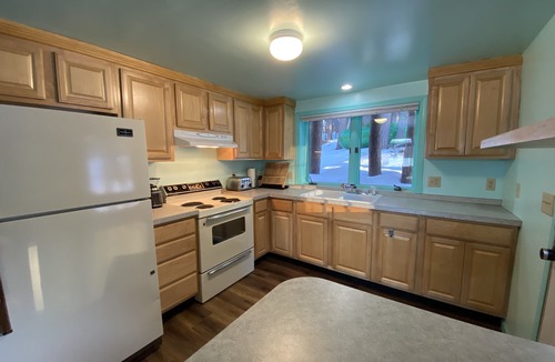 Wetmore Cottage | Near Munising snowmobile trails. Ride out from the property