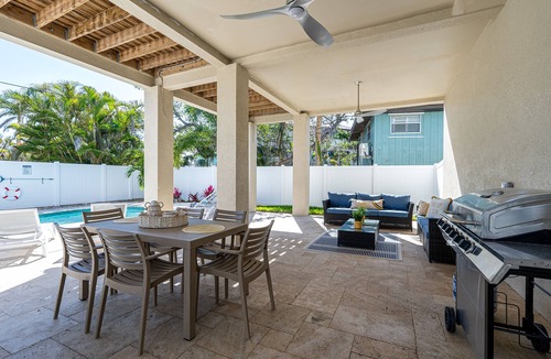 Mid Island House | New 4BR Oasis: Walk to Beach, Pool, Pet-Friendly!