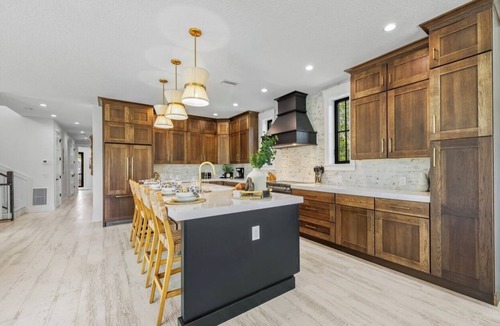 Saint Armands Key House | New 8 bedroom house with tropical oasis backyard! Heated pool and spa.