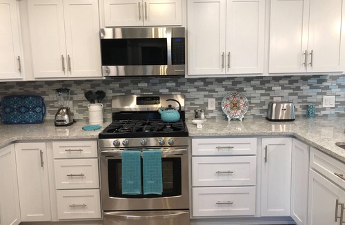 Traverse City House | NEW LISTING - West Bay View - Upscale newly renovated cottage on M-22