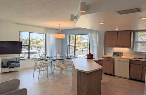Burnt Store Marina Condo | NEW NEW Burnt Store Marina Front, Premier Corner Unit, 30-Day Minimum Retreat