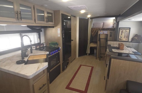 Prince House | New River RV Travel Trailer with 1 King bedroom and bunks - 2 small children.