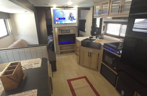 Prince House | New River RV Travel Trailer with 1 King bedroom and bunks - 2 small children.