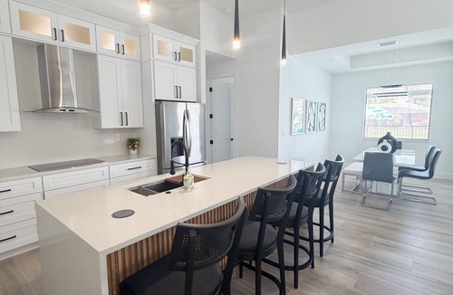 Trafalgar House | Newly Built Modern Vacation Home 4 BR/3 BA Your Own Heated Pool, Lanai on Canal