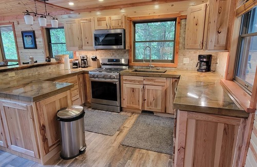 Thompsonville House | Newly remodeled Beautiful Betsie river home 500'waterfront Ski fish explore