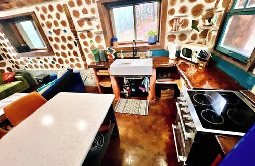 Lupton City Cabin | One-of-A-Kind: Handmade Glass Bottle & Cedar Cabin