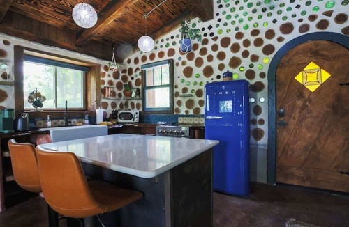 Lupton City Cabin | One-of-A-Kind: Handmade Glass Bottle & Cedar Cabin