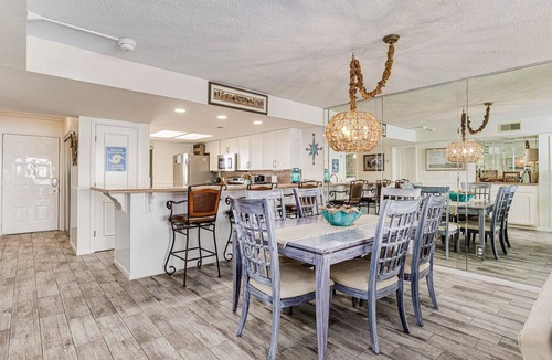 Orange Beach East Condo | Orange Beach Gulf-View 2BR Sleeps 5 65" TV High-Top Chairs Pools Boats