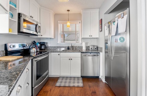 Colington Condo | Oyster Pointe E3: Soundfront | Shared Pool, Tennis