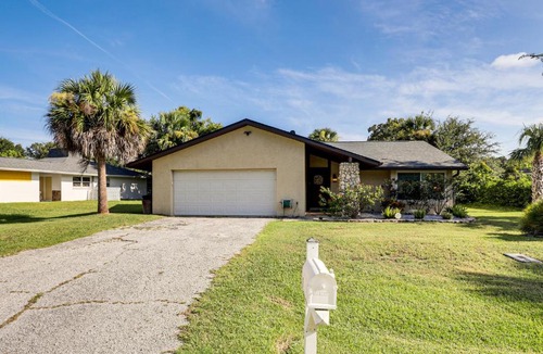Palm Harbor House | Palm Coast Escape w/Outdoor Oasis: 6 Mi to Shore!