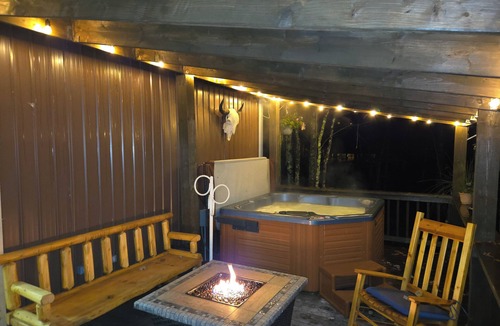Irons Cabin | Peaceful 2-bedroom cabin with AC in charming Irons, hot tub, sauna, covered deck
