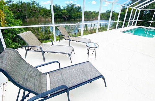 South Gulf Cove House | Peaceful 4/2 pool home on canal w/gulf access--10 min to beach!