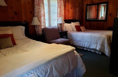 Gaylord Hotel | Pine Cone Inn - Room M9 with 2 Double beds located across from Otsego Lake.