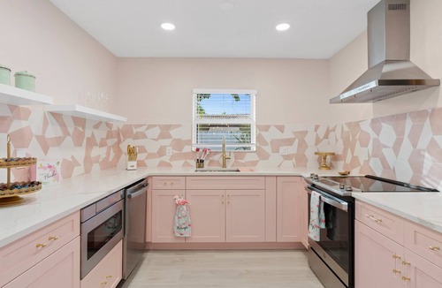 Coral Ridge Villa | Pink Palm Pool Paradise: Perfect Place for Photos