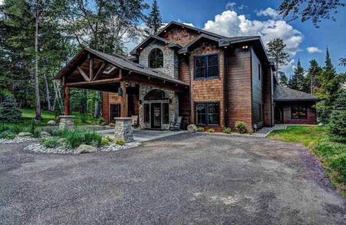 Eagle River House | Plush lakefront lodge with private dock, high-speed WiFi, & game room