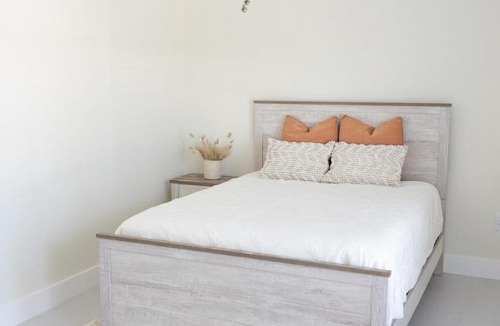 Mid Island House | Point Break! Walk to Beach - Cozy Beach Family Cottage with Pool
