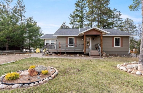 Emily House | Pristine home with sandy beach, firepit, dock and pontoon. ATV trails nearby.