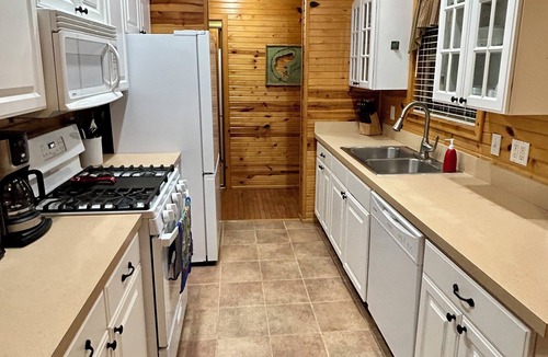 Mears House | Privacy and Luxury await! Fire Pit Patio, Large Outdoor Deck, and Heated Pool.
