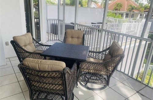 Vanderbilt Beach Condo | Private extended deck with steps down to the pool! - Reg 5-205