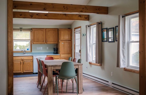 Gaylord House | Private Lake Front, Fire Pit, Grill, Backyard, AC, Hot Tub