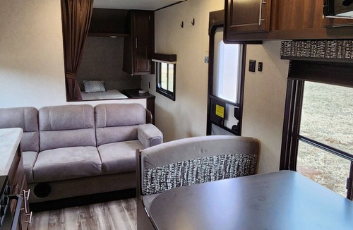 Oshkosh RV Rental | Private Paradise Camper Beach, Pond, Firepit