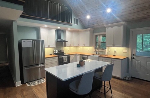 Oxford House | Quaint cabin style house, modern finish, Beautiful open concept and pond view