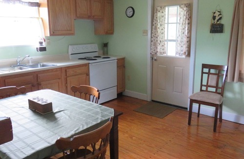 East Bernstadt Cabin | Quaint, Cozy, Comfortable Cabin W/ HotTub, Big Backyard, Pond, Pet Friendly