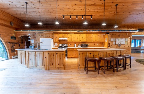 Rapid River House | Rapid River Lodge: Ease into Summer – Relax by the River!