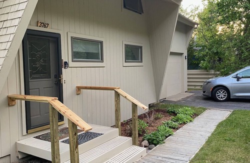 Lake Township Cottage | Relax and play in the blue waters of Crystal Lake