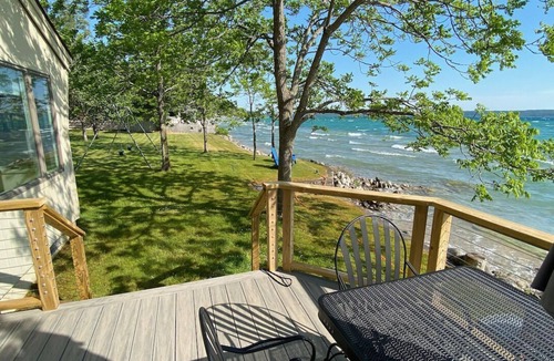 Lake Township Cottage | Relax and play in the blue waters of Crystal Lake