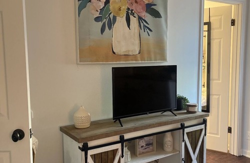Alexandria House | Remodeled duplex with fireplace and patio