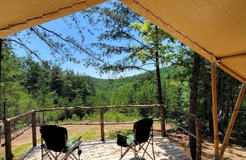Lenoir RV Rental | Remote Off-Grid Safari Tent with Private Mountaintop Ridge on 180 Acres Near Lenoir, NC