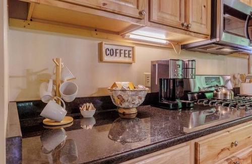 Bryson City Apartment | Renovated Log Cabin on Creek | Hot Tub | Fire Pit | Smokies