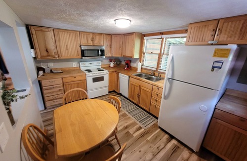 Warrensville Cabin | River Otter Cottage On The New River Perfect for couples or family adventure