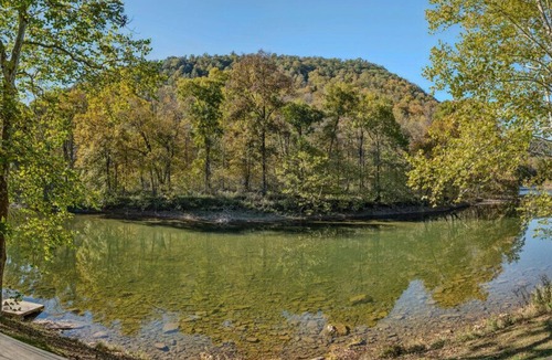Great Cacapon Cabin | River Song Retreat - Waterfront w/Hot Tub, Fire Pit, Deck & Water Toys!
