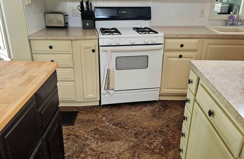 Coopersville Cottage | River with boat launch and lake. Kayaks and paddle boards included!