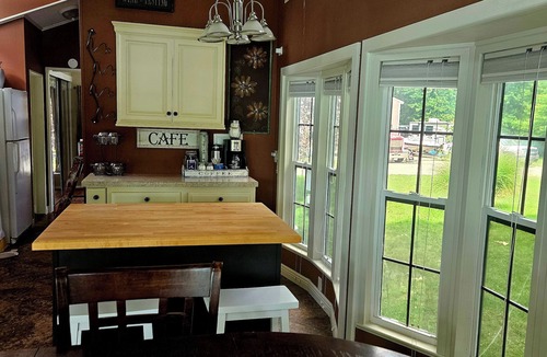 Coopersville Cottage | River with boat launch and lake. Kayaks and paddle boards included!