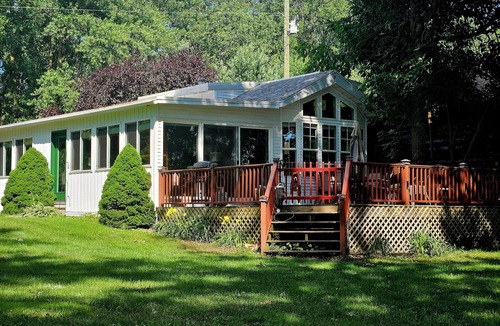 Coopersville Cottage | River with boat launch and lake. Kayaks and paddle boards included!