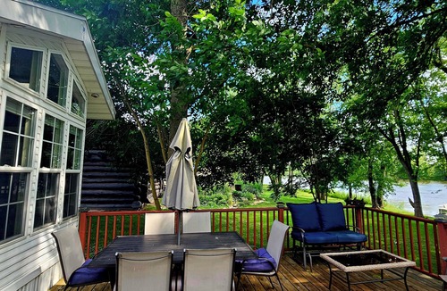 Coopersville Cottage | River with boat launch and lake. Kayaks and paddle boards included!