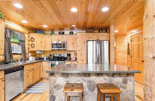 Lyndon Station House | Riverfront cabin with a dock, kayaks and a canoe - firepit and water views