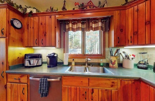 Manitowish Waters House | Riverfront home on the Manitowish Riverway w/fire pit, kayaks & boat house