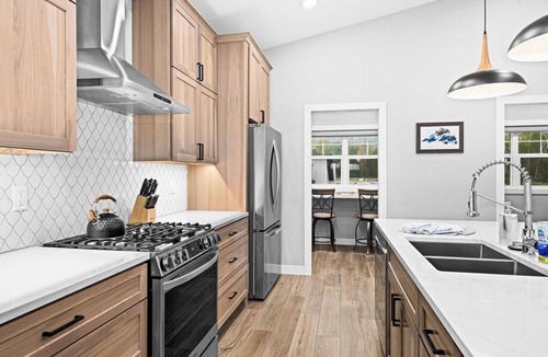 Duluth Apartment | RiverWest Superior Chalet - River Front - Sauna - Dog Friendly