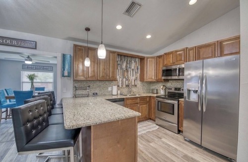 Royal Palm Beach House | Royal Palm 4BR Oasis- Tranquil Patio, Prime Location