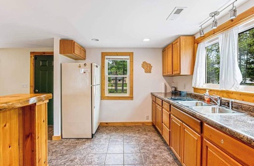 Mather House | Rural retreat near Necedah National Wildlife Refuge with deck, firepit, & grill