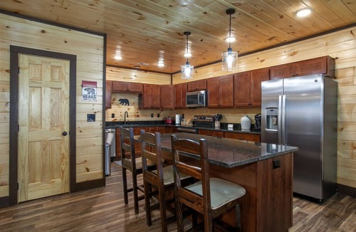 Sevierville Cabin | Rustic-Chic Retreat with Hot Tub, Stone Fireplace & Game Room